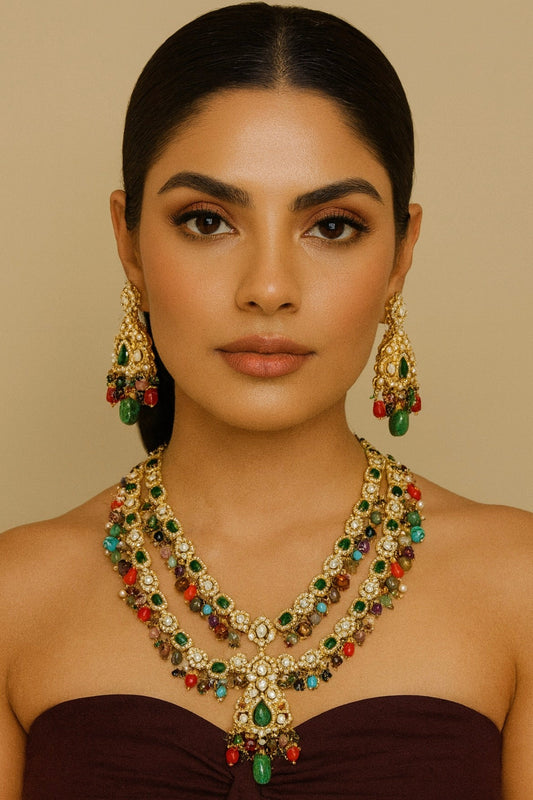 Woman wearing a colorful necklace and earrings against a beige background