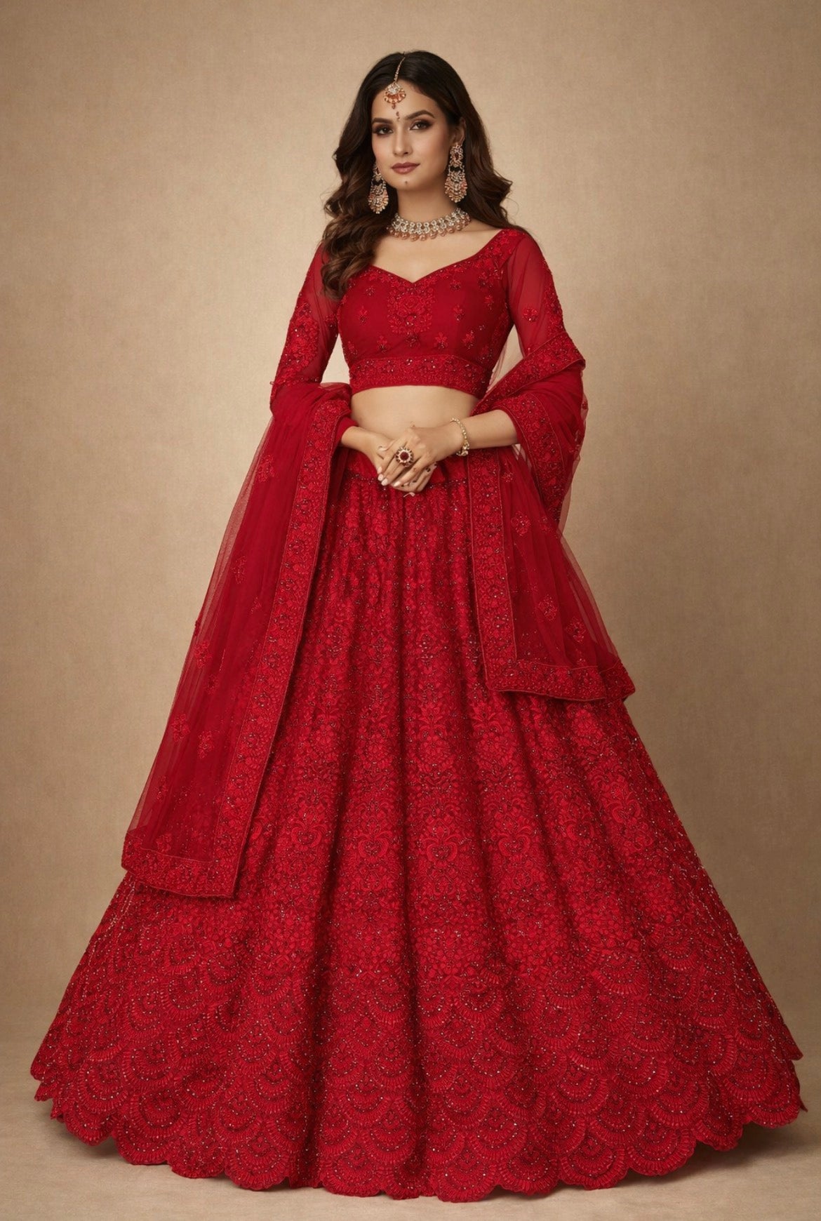 Red traditional outfit with intricate patterns on a beige background